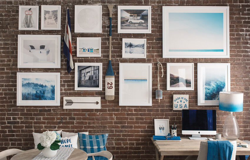 An exposed brick wall is the perfect backdrop for a gallery wall.