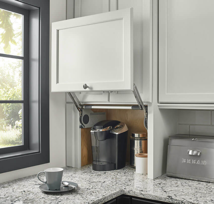 Adding an appliance garage will free up counter space in your small kitchen.