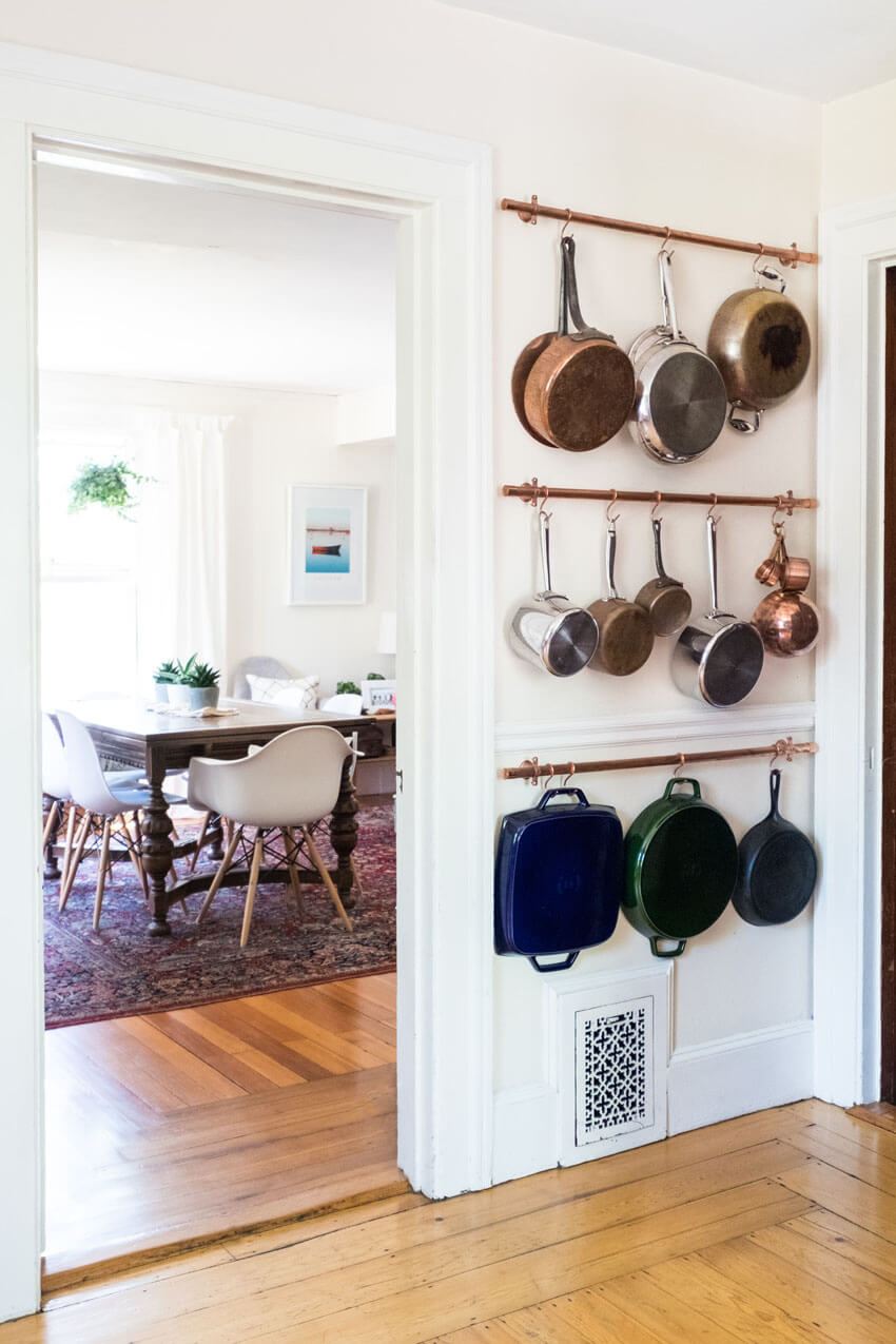 A pot rack, whether on the wall or hanging from the ceiling, will help add space to your small kitchen.